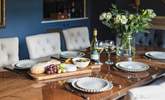 Chat the night away with family and friends around this refined dining-table. - Thumbnail Image