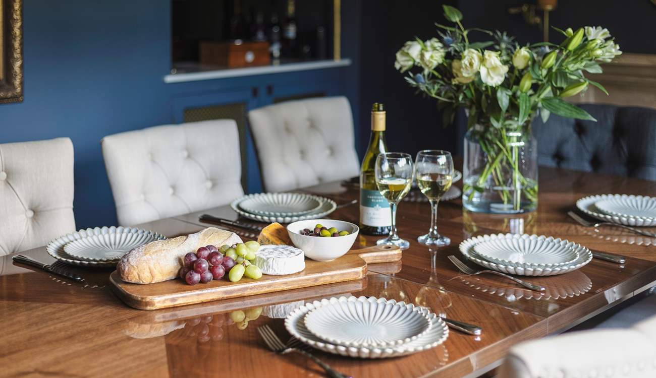 Chat the night away with family and friends around this refined dining-table.