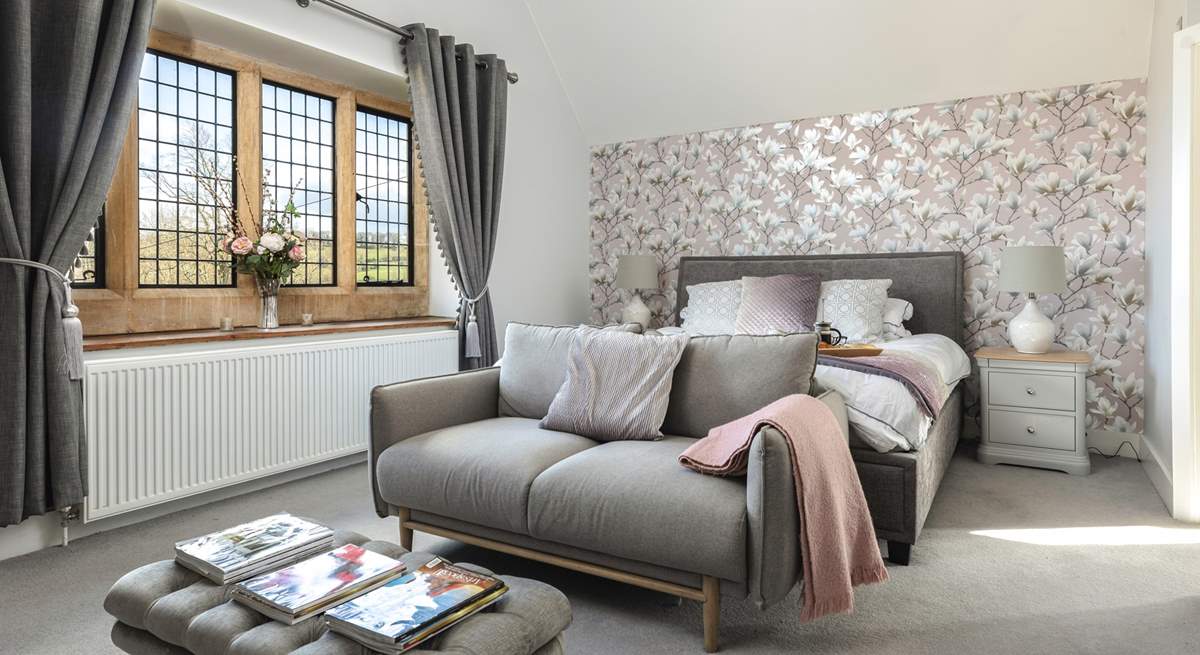 The main bedroom boasts an opulent super-king bed and comfy sofa.