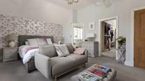 The main bedroom offers the ultimate in luxury and enjoys a spacious walk-in wardrobe.