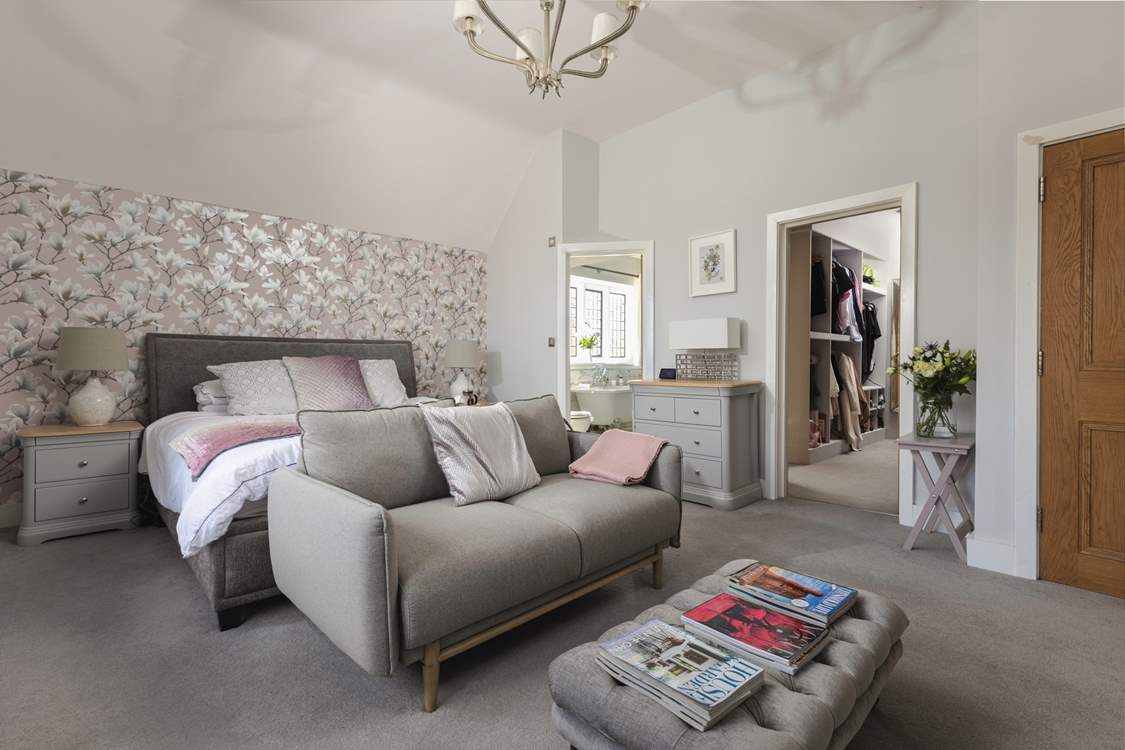 The main bedroom offers the ultimate in luxury and enjoys a spacious walk-in wardrobe.