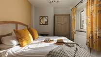 Mellow yellow is the word in bedroom 2!