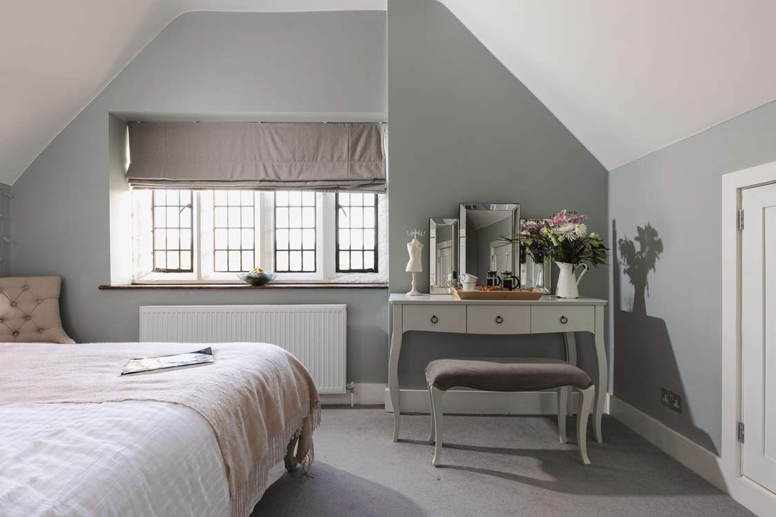 The dressing area is the perfect place to get ready for the evening.