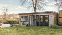 An additional outbuilding, offers a charming self-contained living space for two guests.