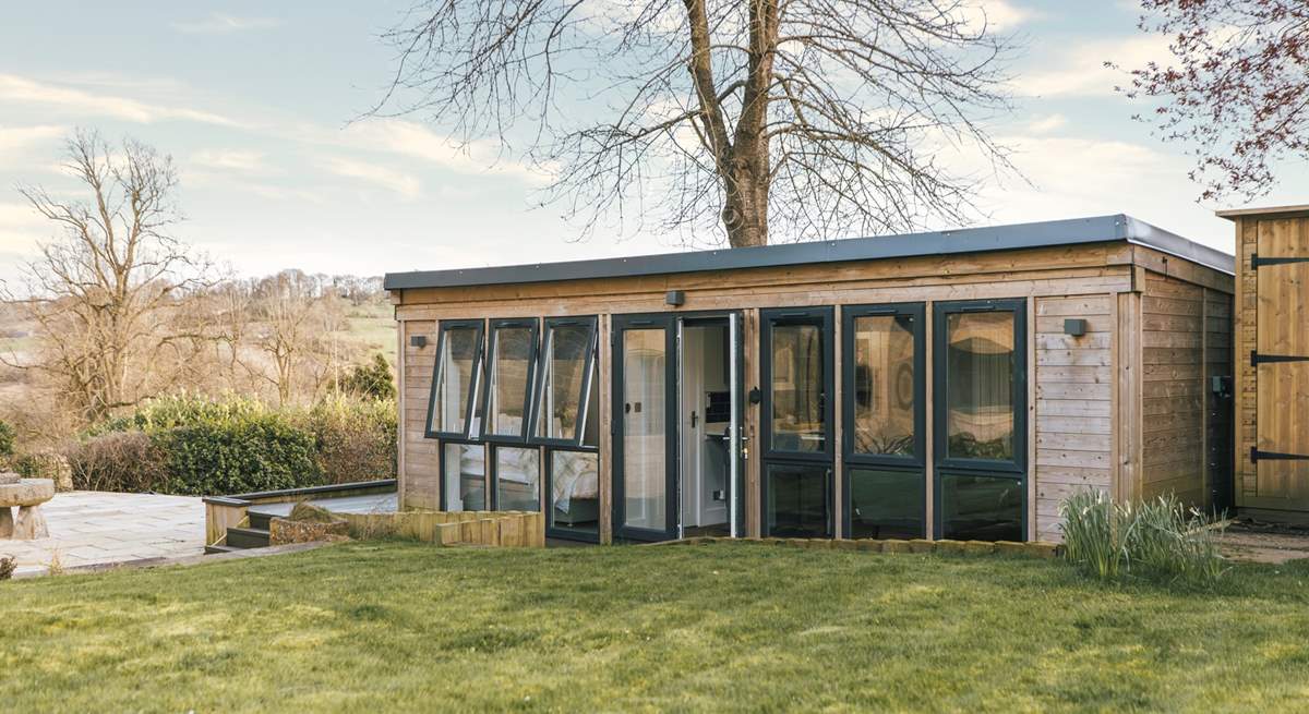 An additional outbuilding, offers a charming self-contained living space for two guests.