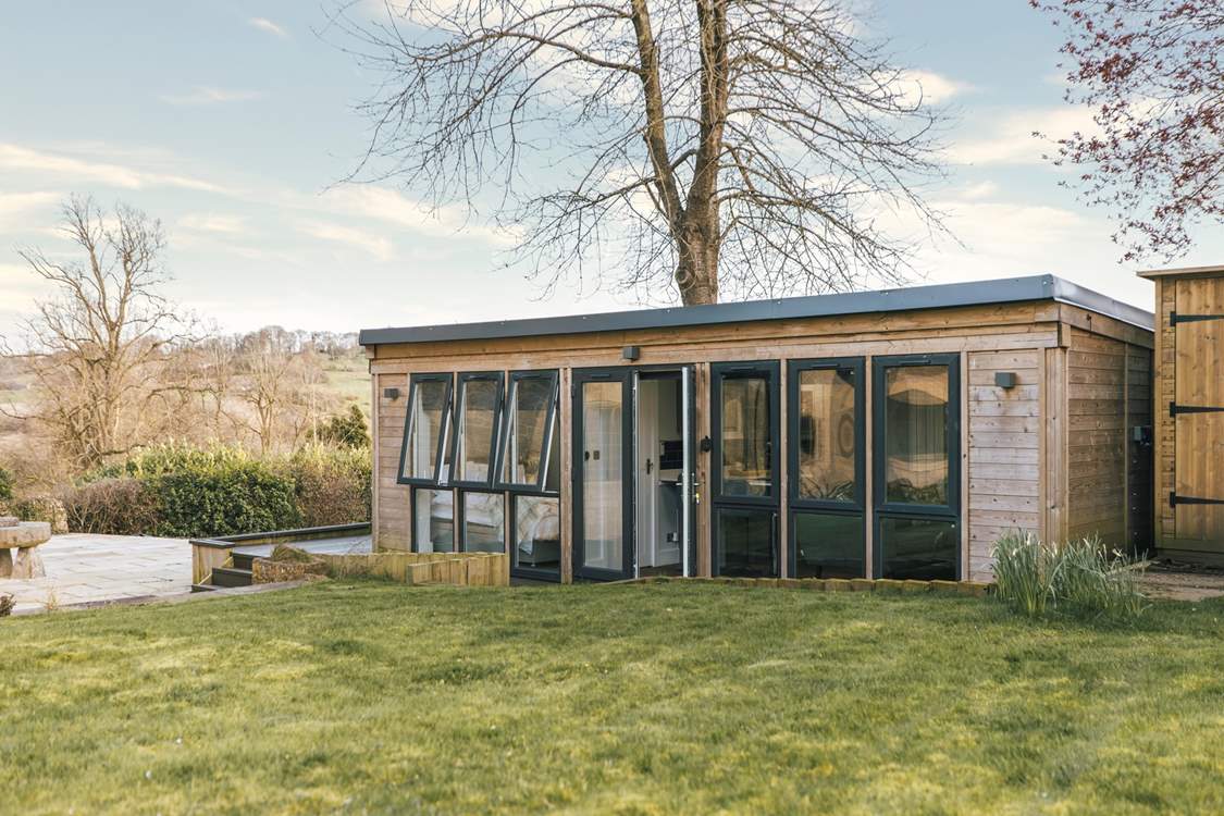 An additional outbuilding, offers a charming self-contained living space for two guests.