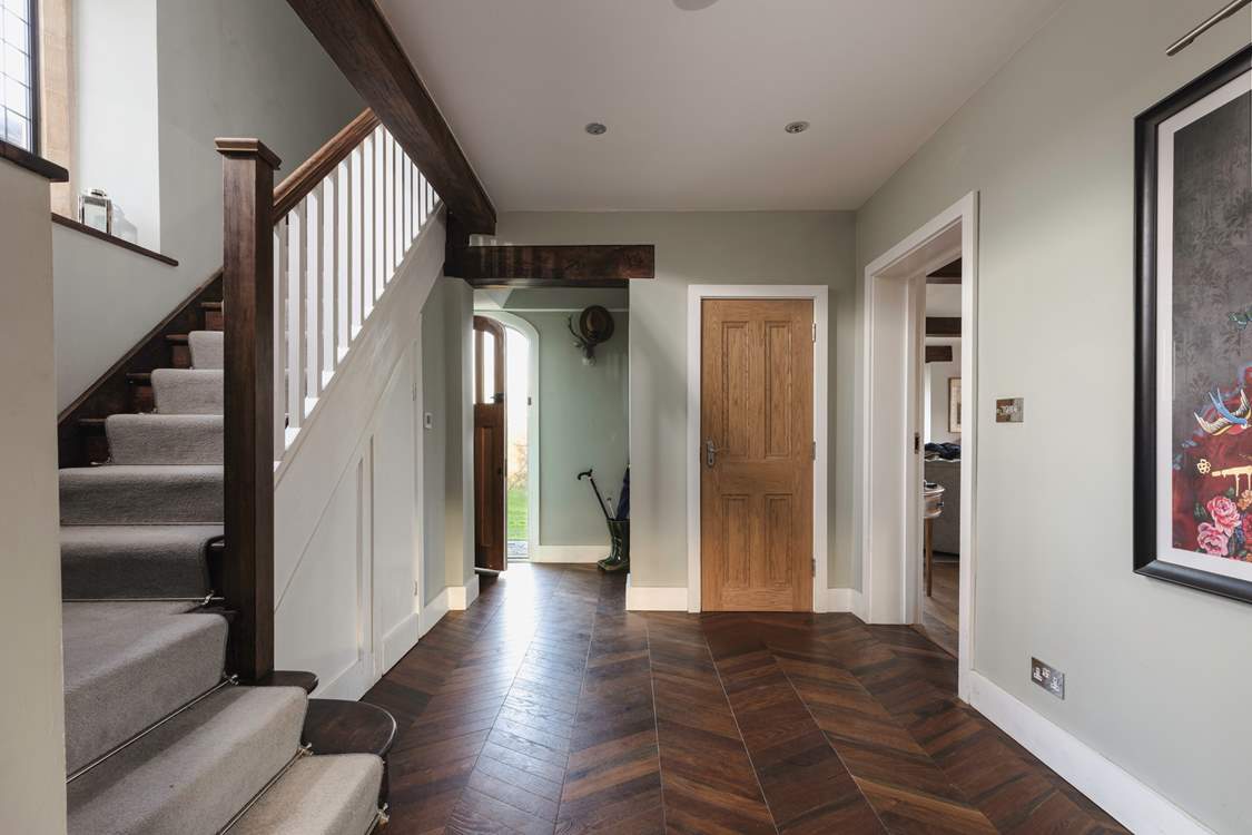 The hallway leads you to the first floor.