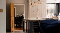 The gorgeous kitchen is perfect for sociable mealtimes.