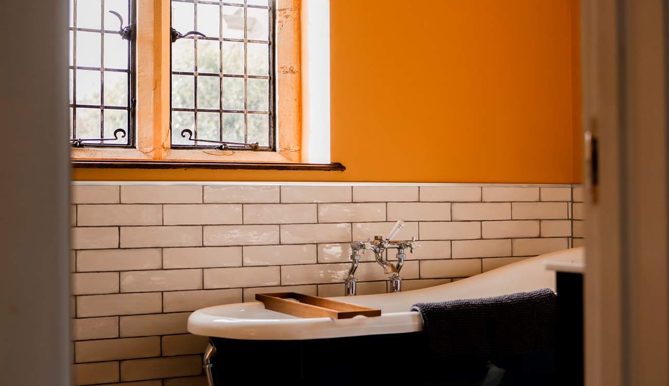 Savour a long, leisurely soak in the roll-top bath tub.