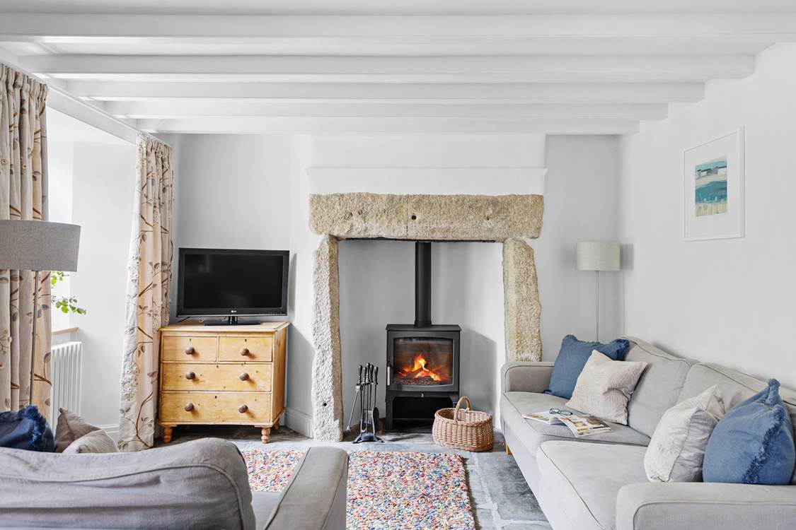 The toasty wood-burner is perfect for chillier days.