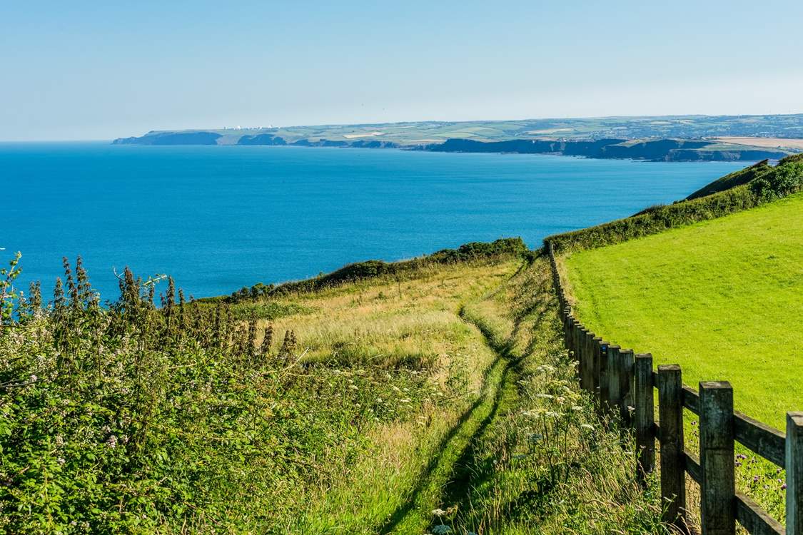 Don't forget your walking boots to explore the coast paths.