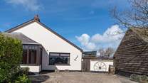 Jump into the hot tub or the nearby sea. St Brides Cottage has it all. 