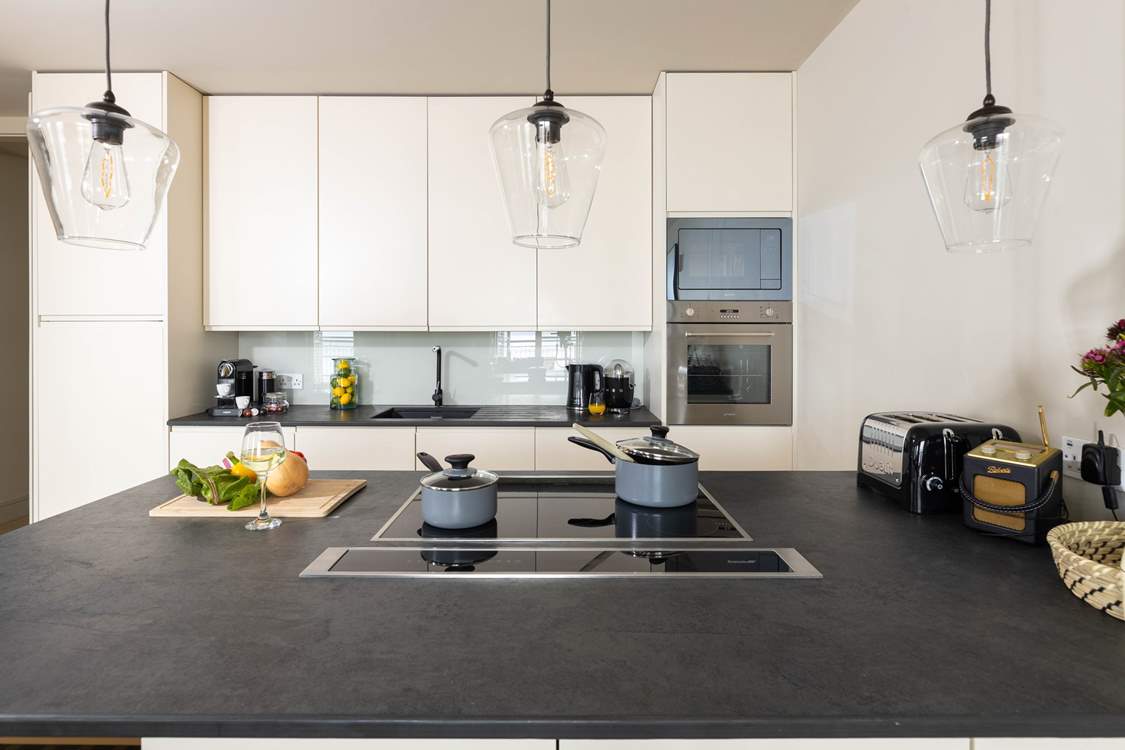 This fully equipped contemporary kitchen will allow you to rustle up a family feast should the mood take you.
