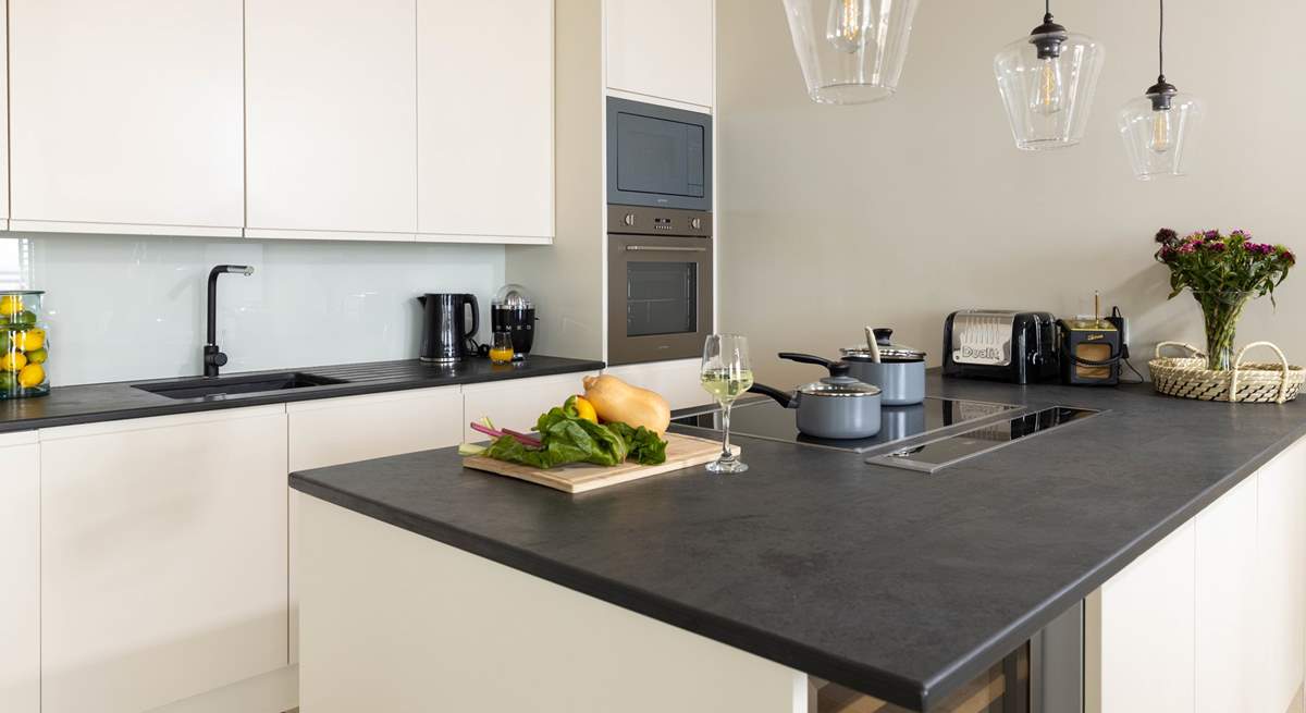 A fully equipped kitchen has to include a full wine fridge!