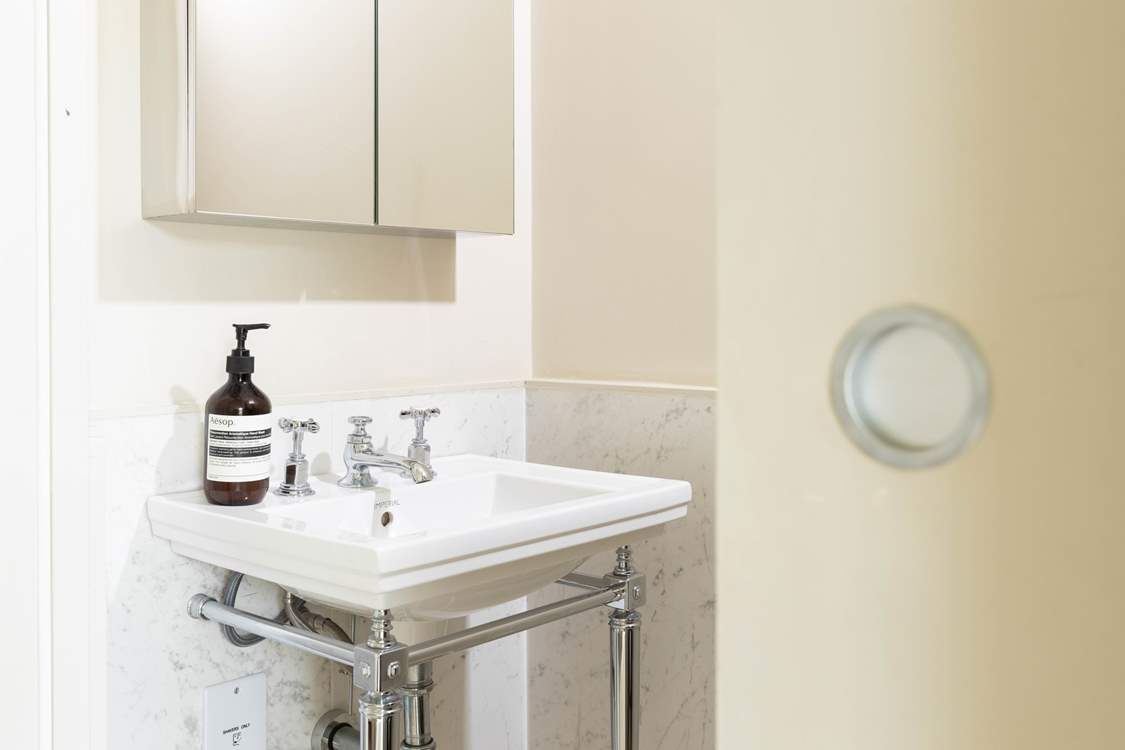 There is also a sink and WC which sits behind pocket doors.