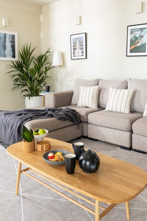 The apartment enjoys a selection of unique coast themed prints and paintings.