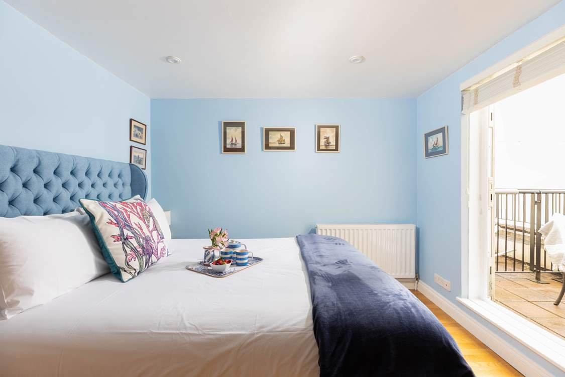 The principal bedroom has a luxurious king-size bed with sea views and its own balcony.