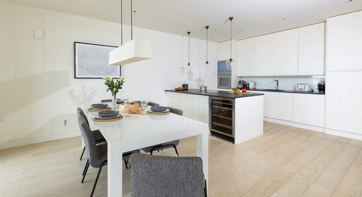 The fully equipped kitchen has the magic ingredient - that all important wine fridge. 