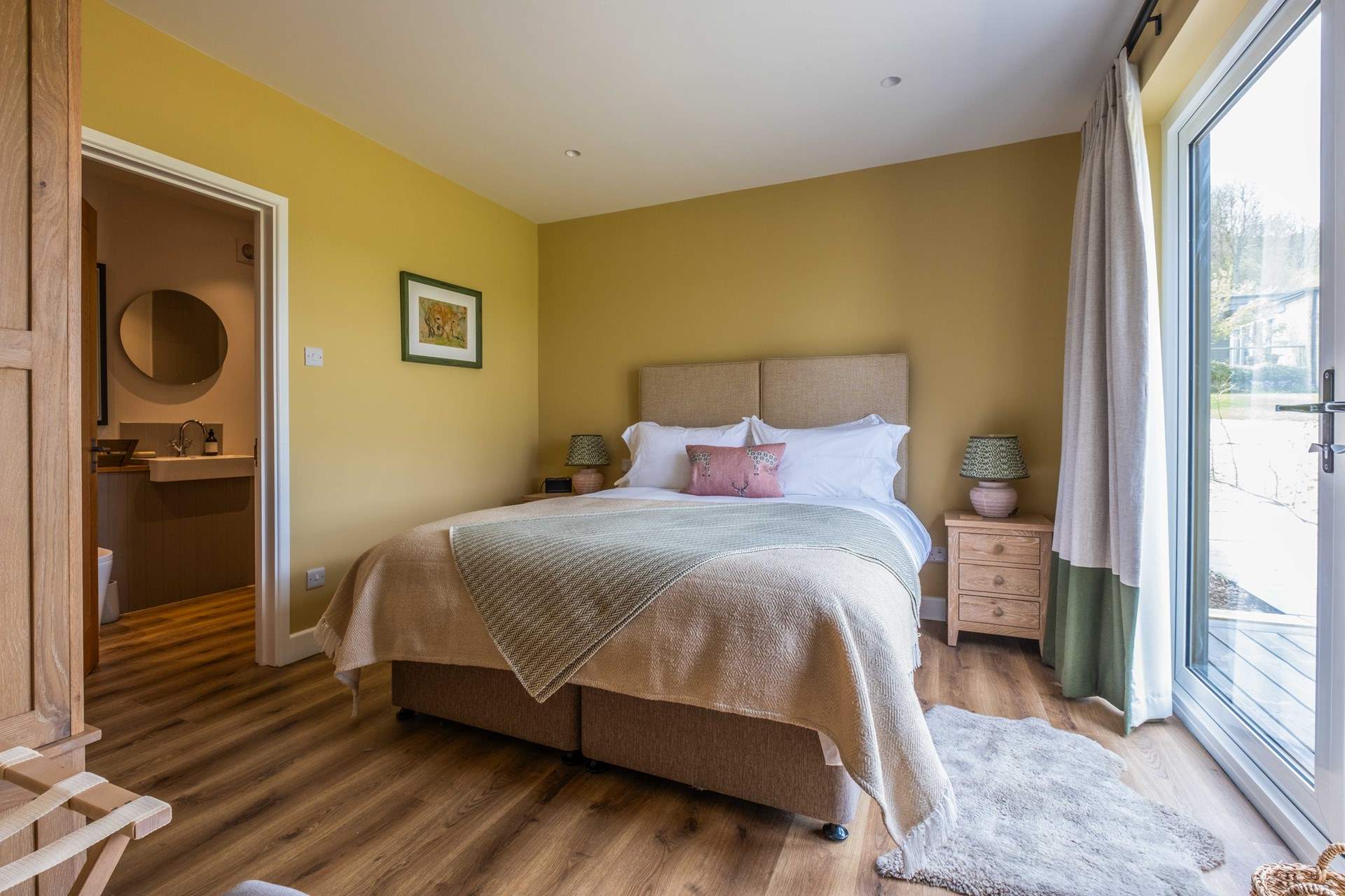 The main bedroom with door to the bathroom (also accessed from the living-room).
