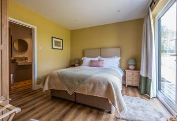 The main bedroom with door to the bathroom (also accessed from the living-room).