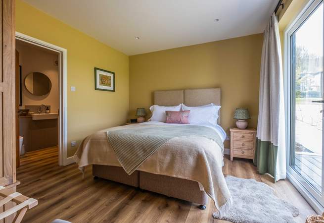 The main bedroom with door to the bathroom (also accessed from the living-room).