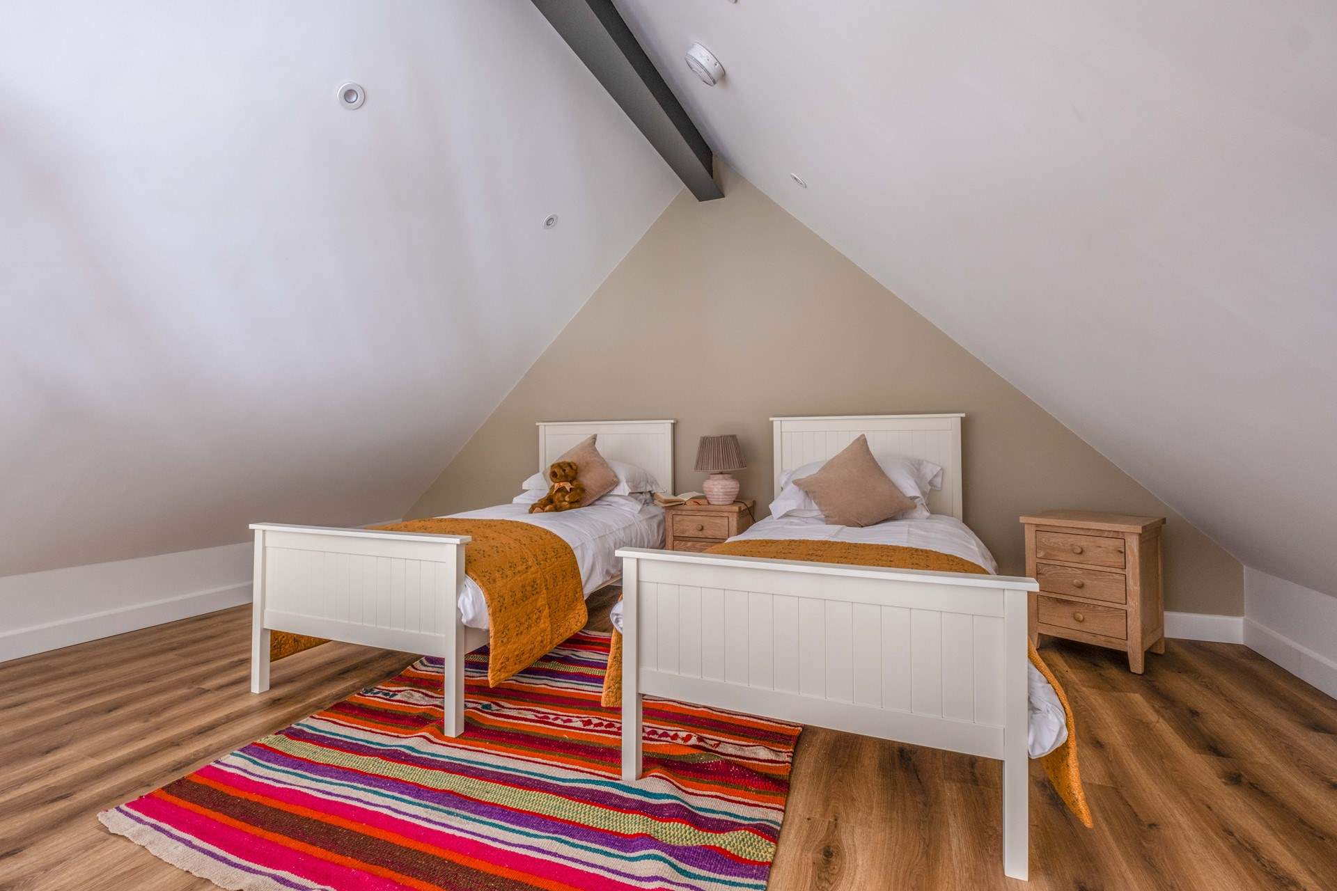 The mezzanine has twin beds.