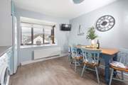 The large bay window in the kitchen/diner overlooks Falmouth.