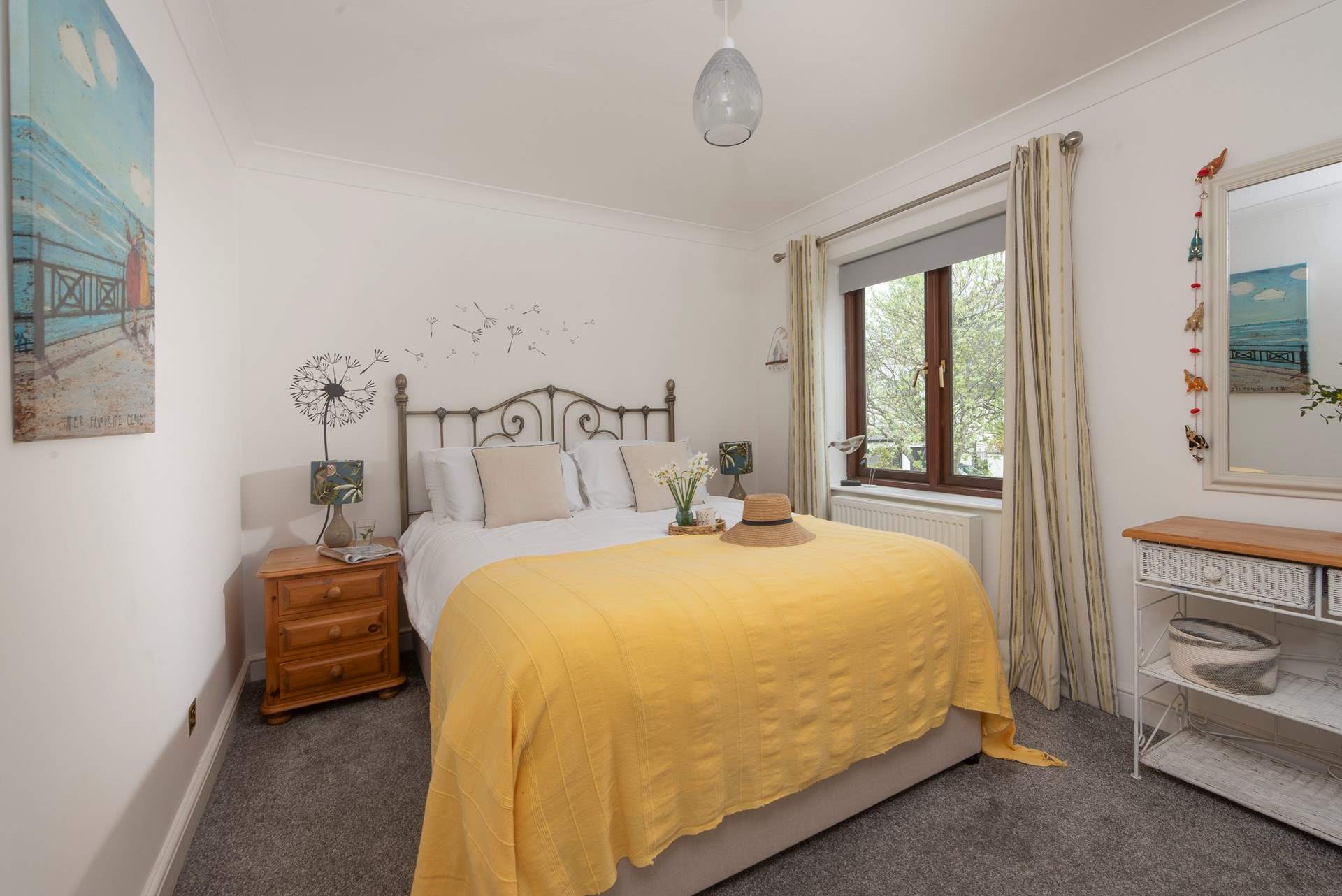 The principal bedroom has a comfy king-size bed. 