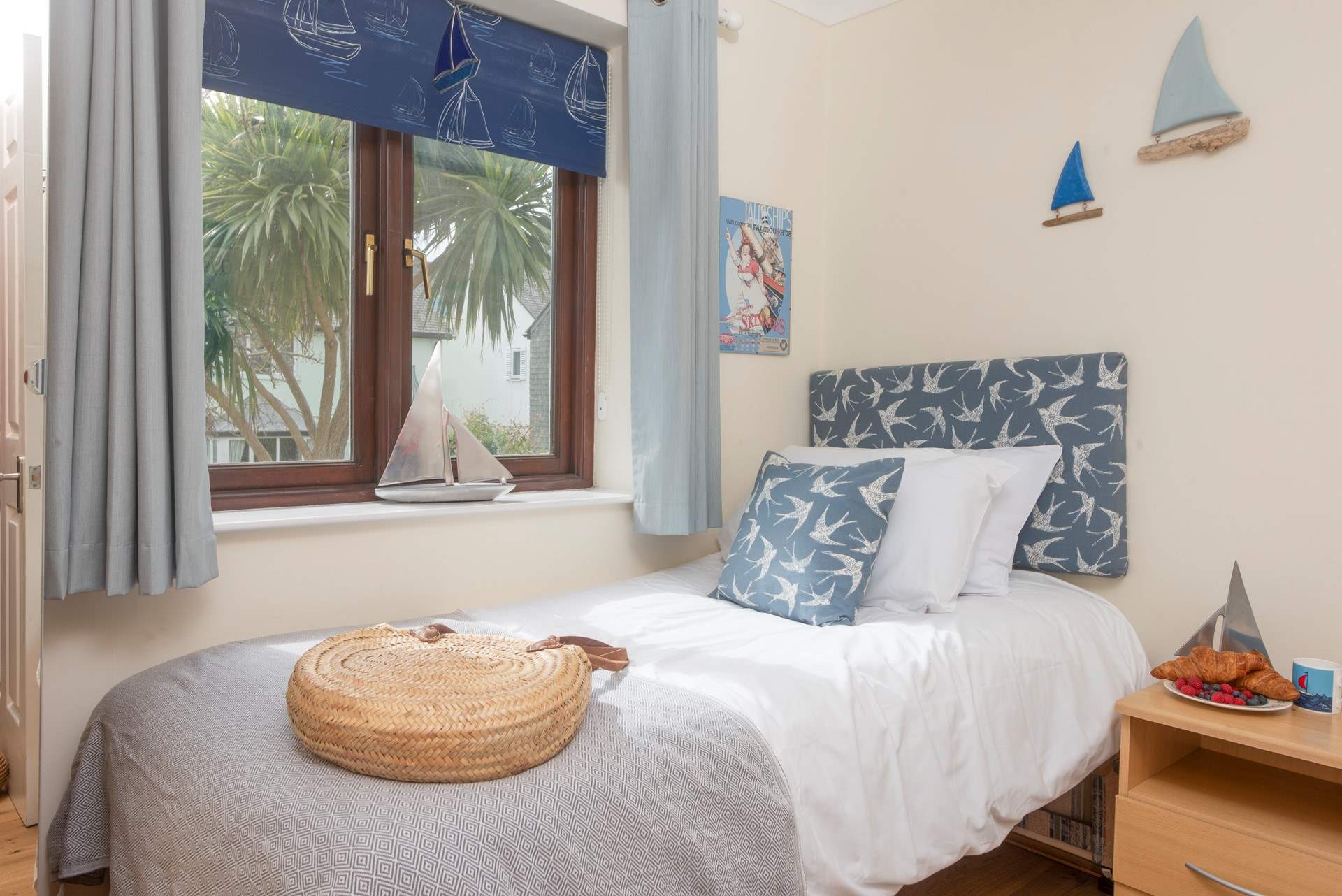 The sweet twin bedroom is perfect. Please note one bed is only 5'9