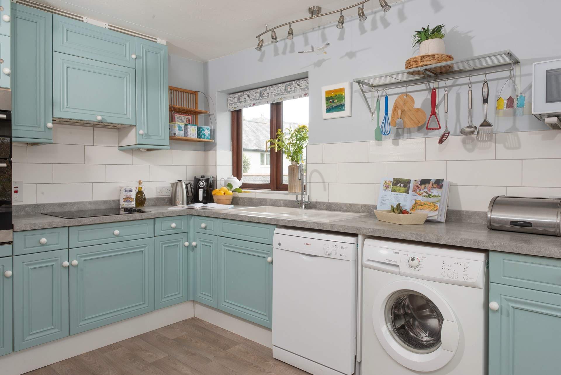 The light and airy kitchen. 