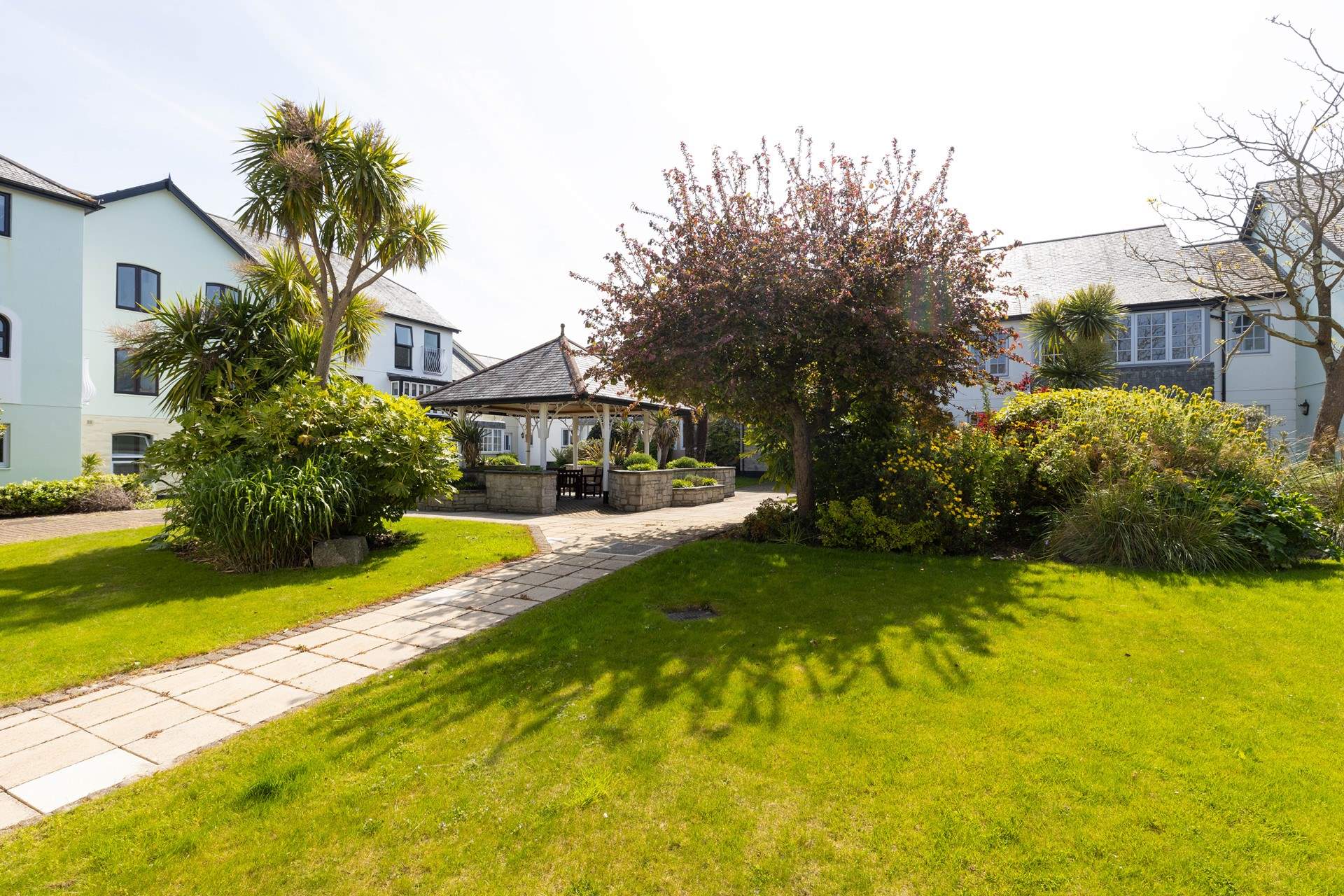Perhaps have a drink in the sunshine under the pergola. 