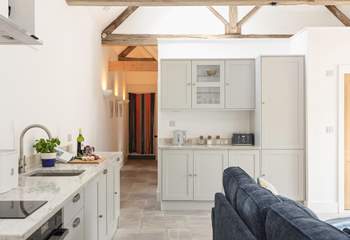 The kitchen is both stylish and practical.