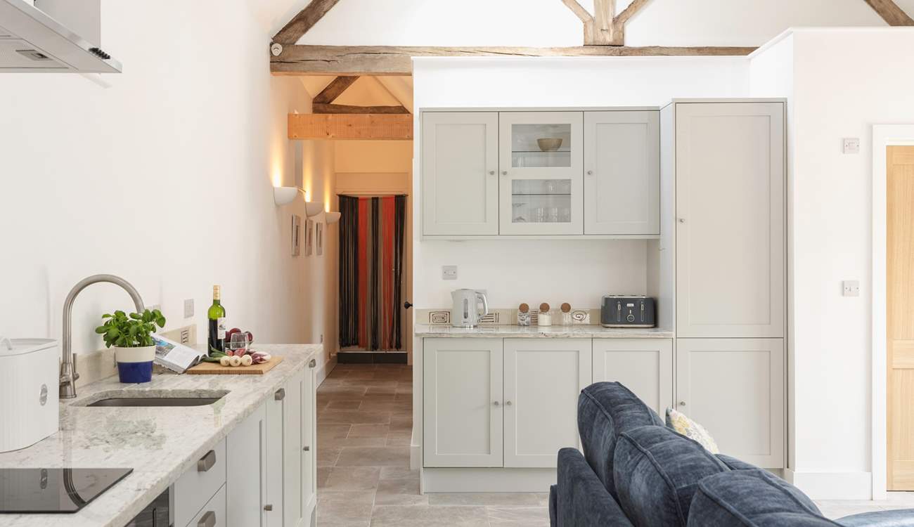 The kitchen is both stylish and practical.