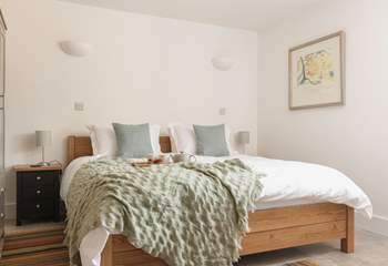 Now that is a comfortable looking bed, you may not want to leave!