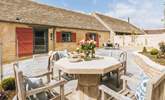 The outdoor dining space for guests staying in Weighbridge End. - Thumbnail Image