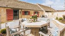 The outdoor dining space for guests staying in Weighbridge End.