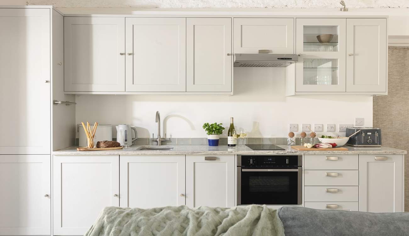 The kitchen is stylish and practical.