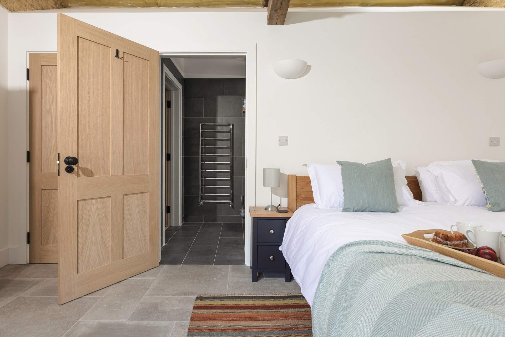 The en suite shower-room also has a door into the hallway for easy access from the living-room.