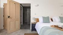 The en suite shower-room also has a door into the hallway for easy access from the living-room.