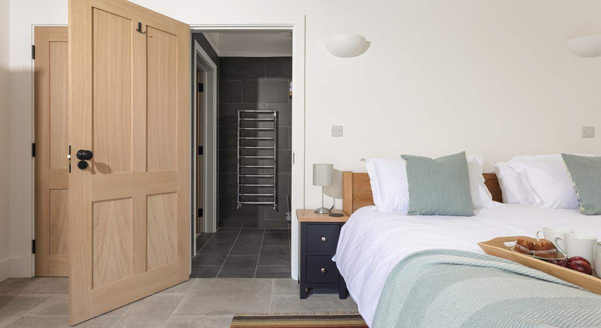 The en suite shower-room also has a door into the hallway for easy access from the living-room.