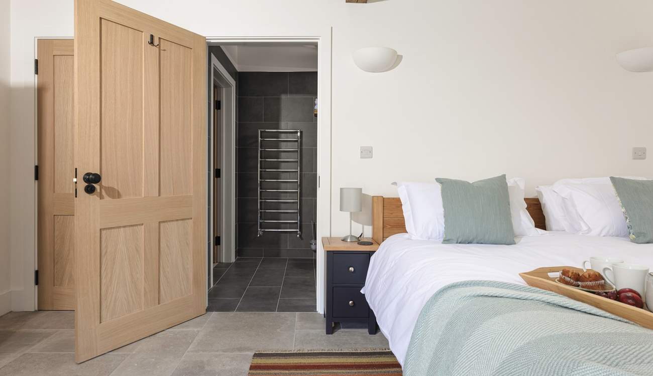 The en suite shower-room also has a door into the hallway for easy access from the living-room.