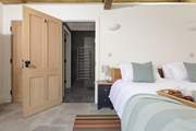 The en suite shower-room also has a door into the hallway for easy access from the living-room.