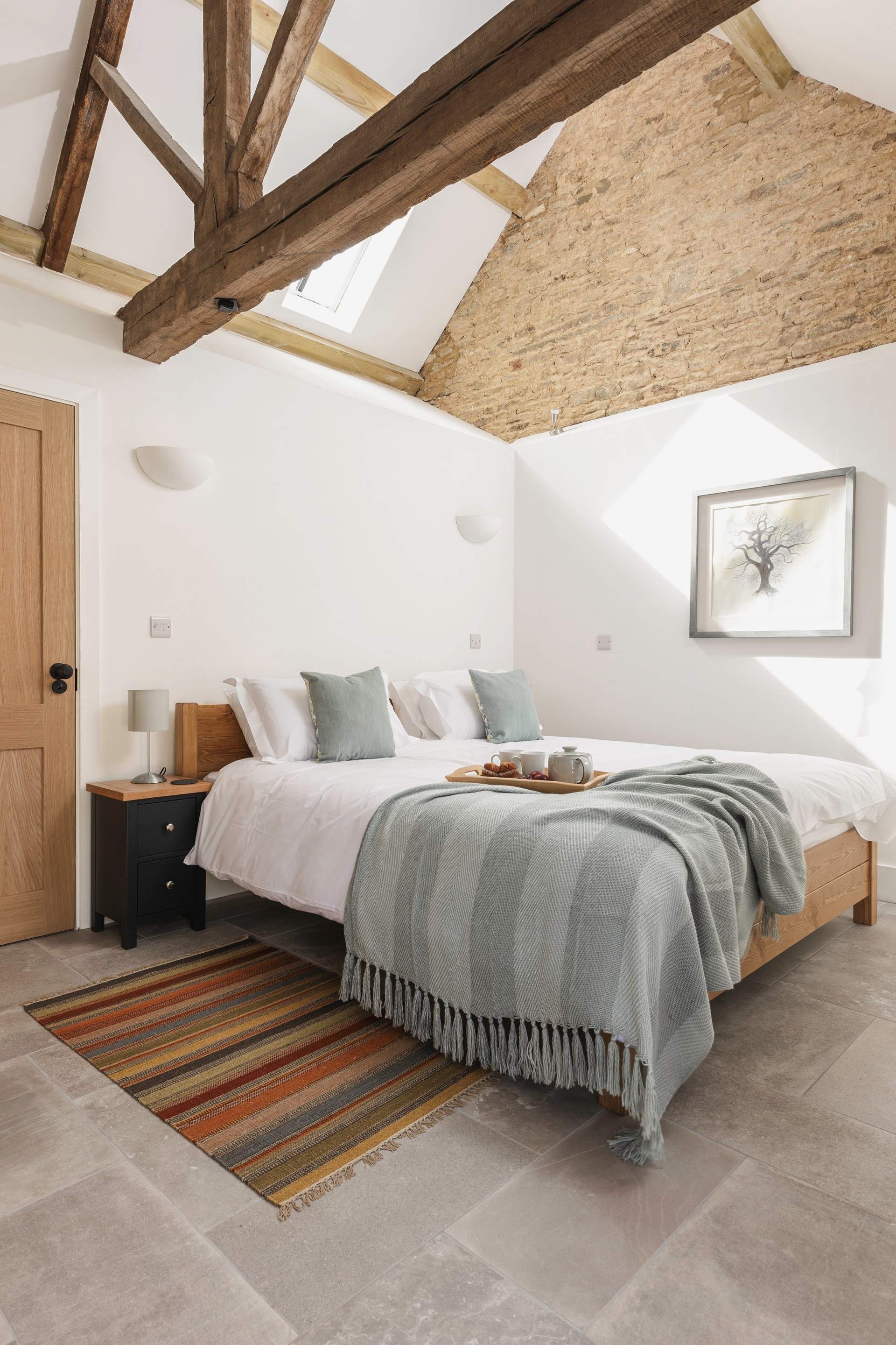 Enjoy the beautiful exposed brickwork and beams.