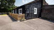 Two parking spaces in front of the cottage.