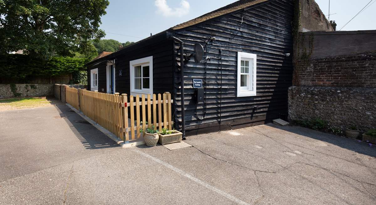 Two parking spaces in front of the cottage.