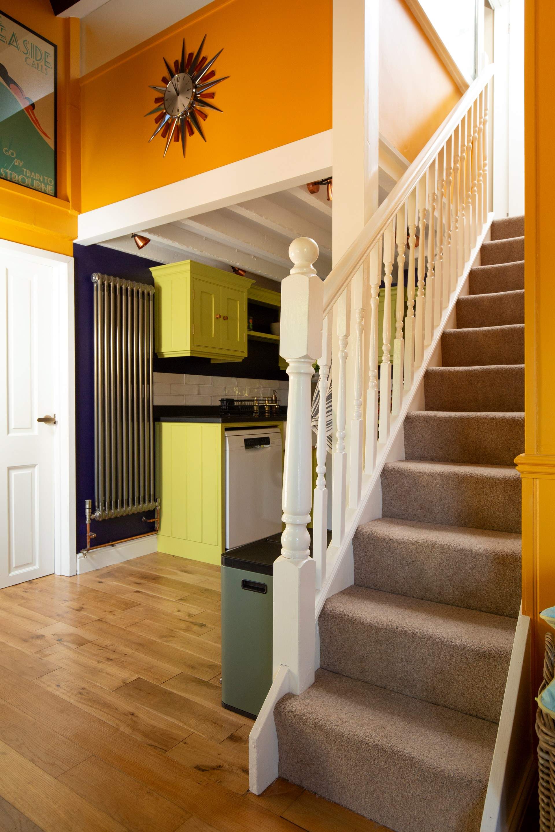 Stairs lead to the double bedroom and bathroom.