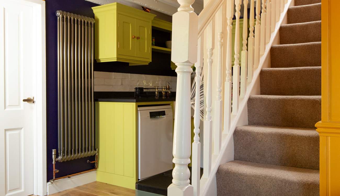 Stairs lead to the double bedroom and bathroom.