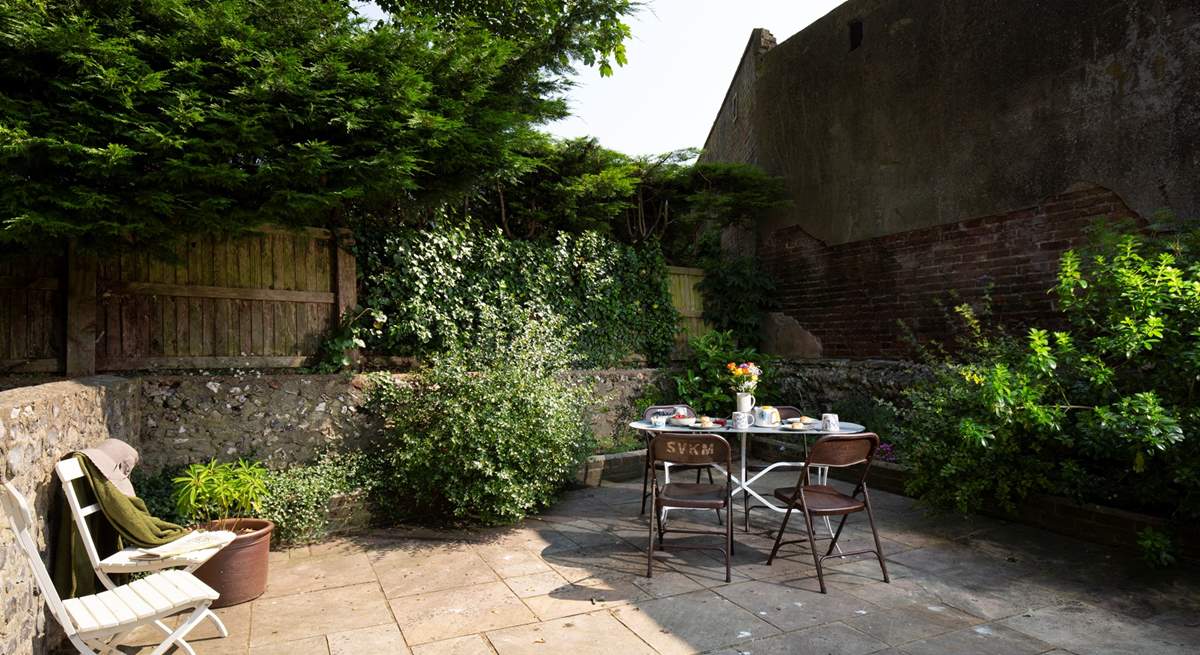 Listen to birdsong in the pretty courtyard garden.