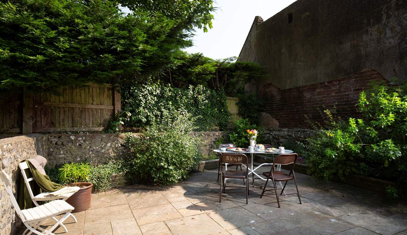 Listen to birdsong in the pretty courtyard garden.