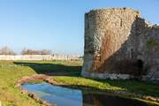 Visit the ruins of Pevensey Castle.